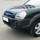 Бампер передний в цвет кузова Hyundai Tucson 1 (2004-2010) под расширители